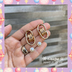 Aretes dos aros entrecruzados