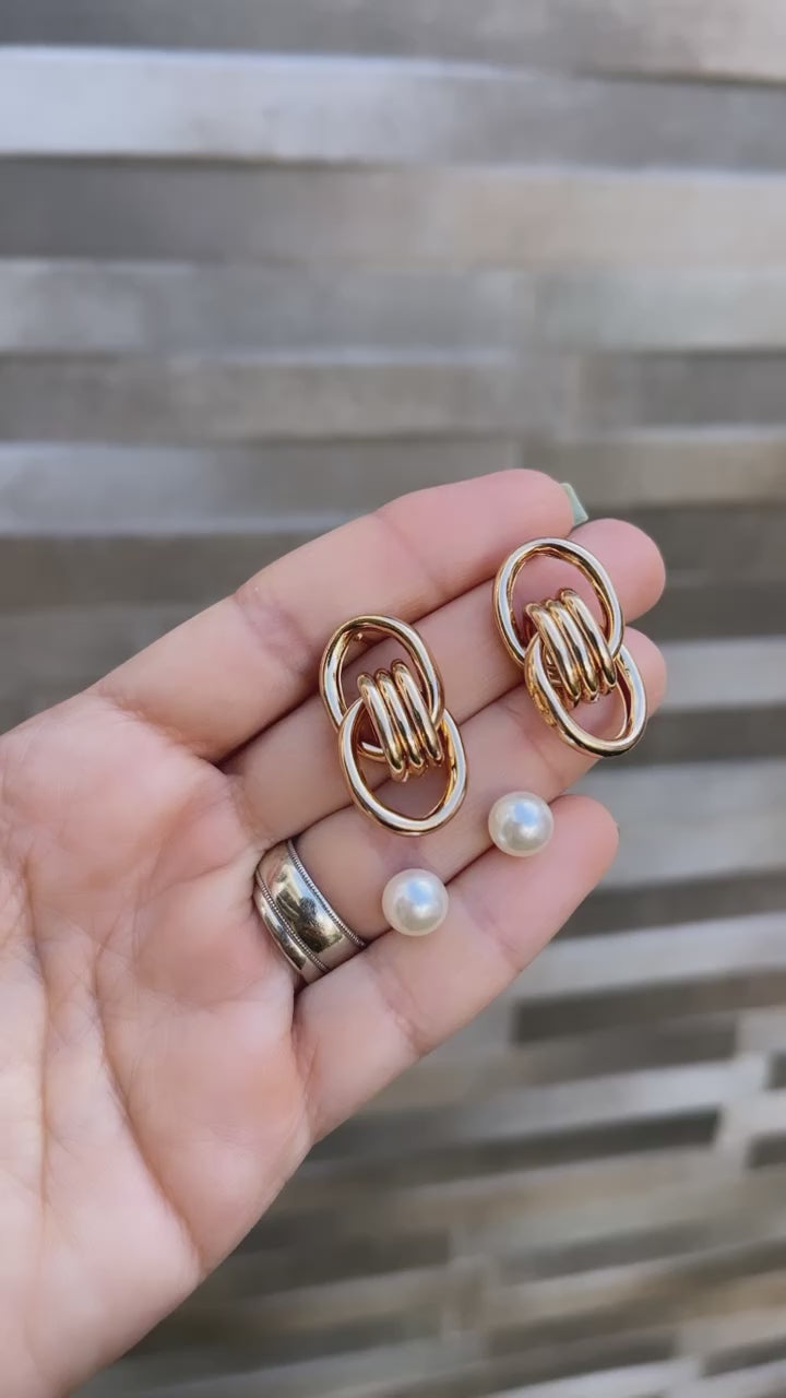 Aretes dos aros entrecruzados